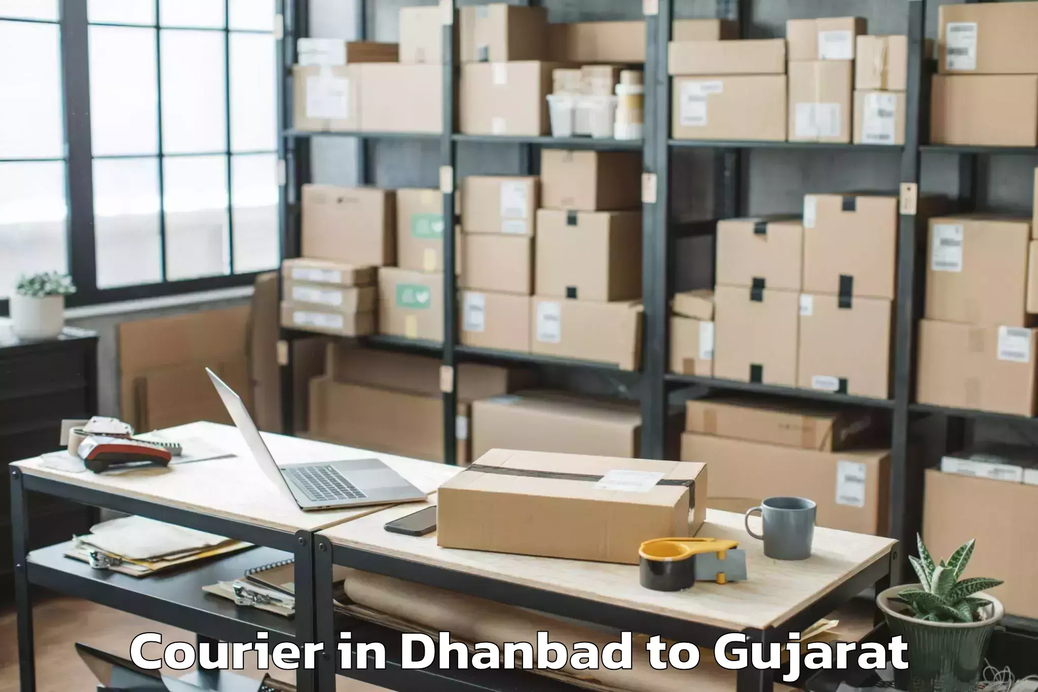 Reliable Dhanbad to Baria Courier